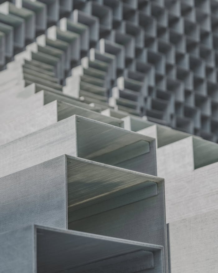 About Close-up of abstract geometric metal structures with a minimalist and urban vibe.